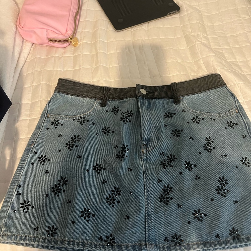 H&M Blue Denim Skirt with Black Floral Design